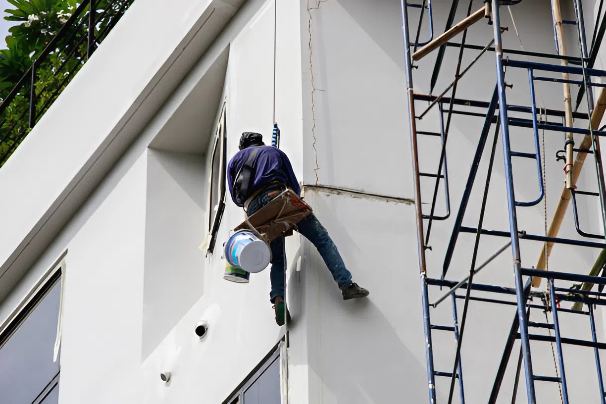 Exterior commercial building being repainted by a painting company in Johnston, IA