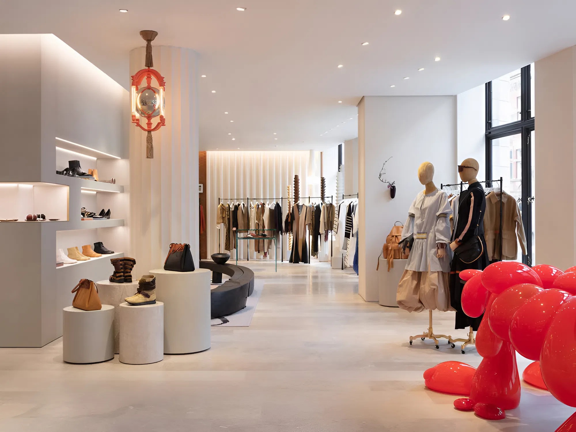 Retail interior with soft white and warm neutral wall tones by an interior painter in Des Moines, IA